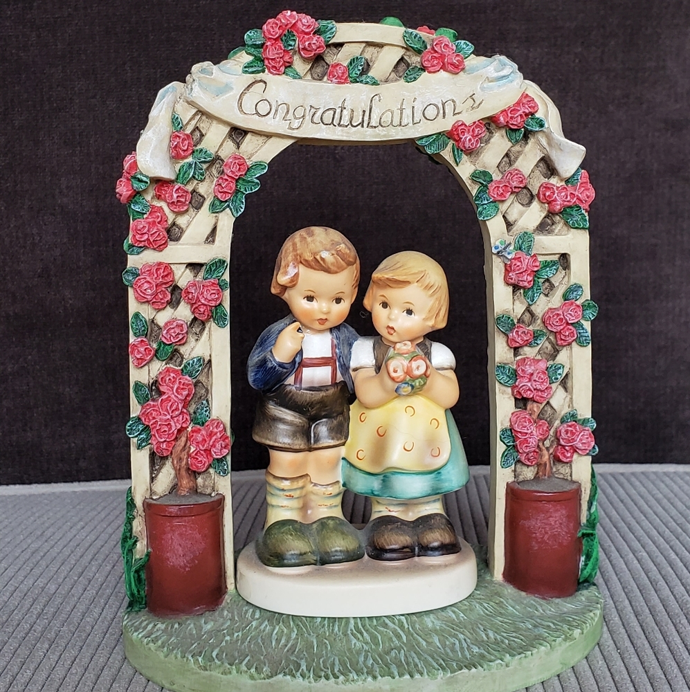 Hummel engagement couple and arch